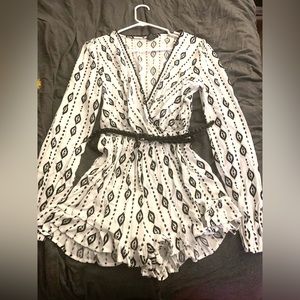 Black and white romper with black belt and open front,size XS